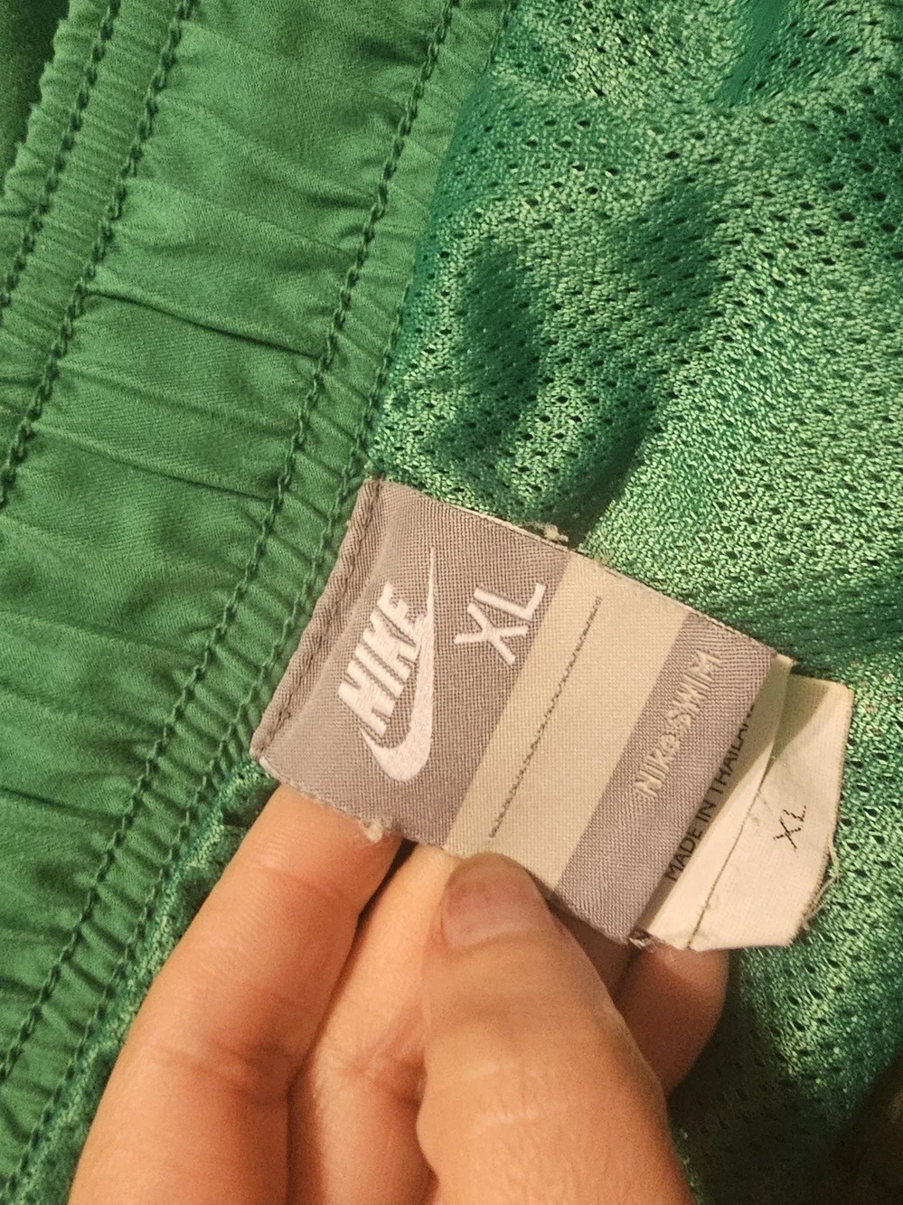 Nike Green Athletic Shorts with White Logo Tag